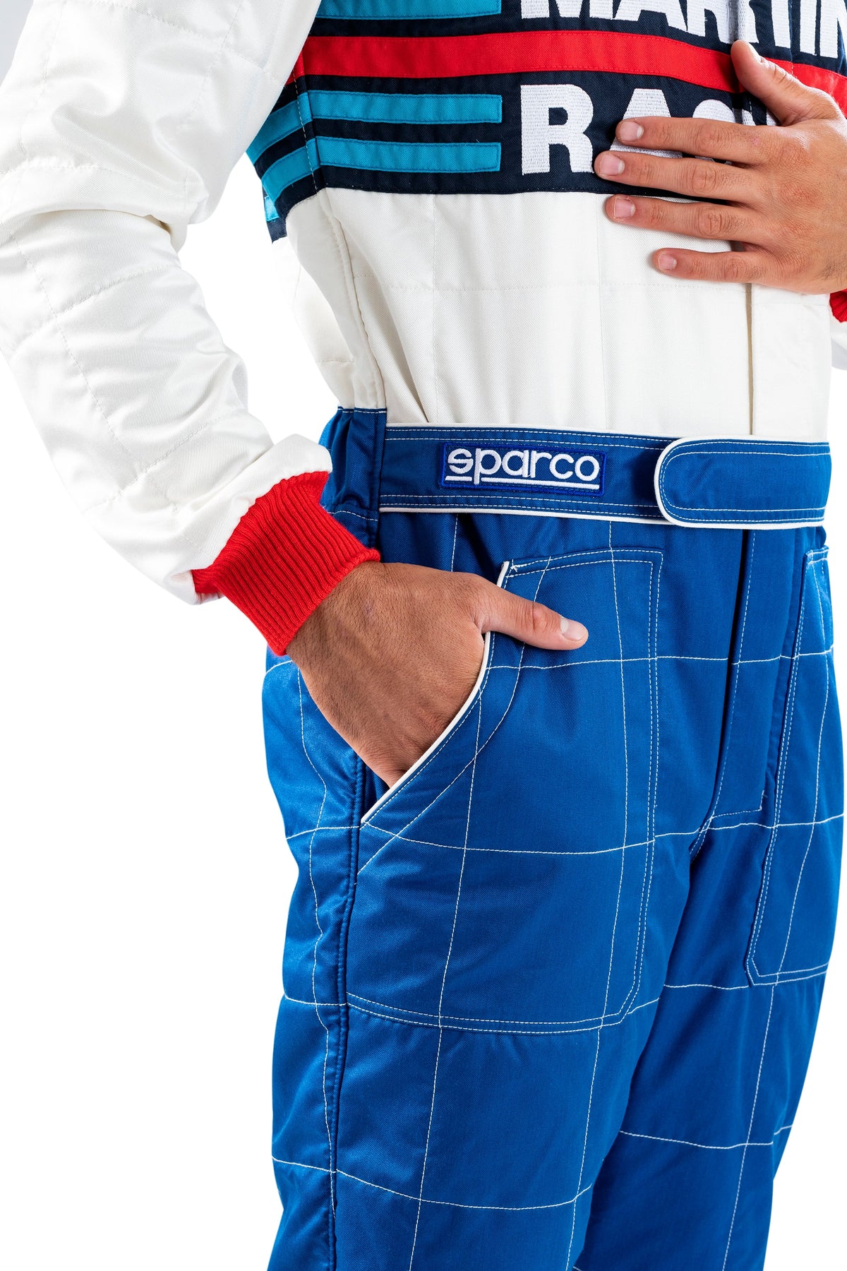 Racing suit waist close-up with sparco belt patch and blue grid pants