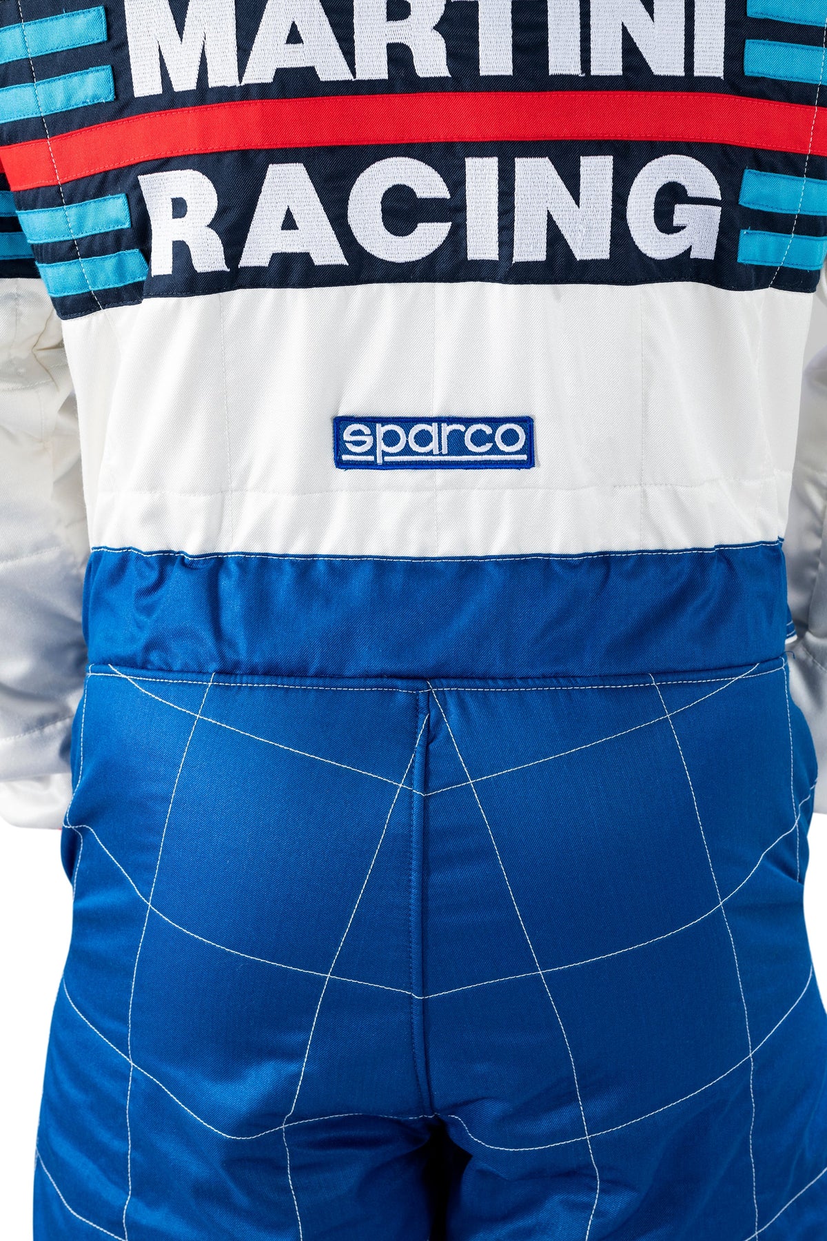 Racing suit chest with Martini Racing text, sparco logo, blue grid pants