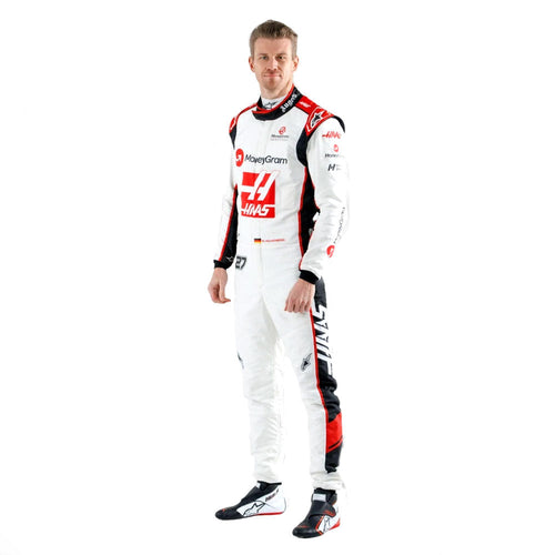 White F1 race suit with red and black panels and sponsor logos