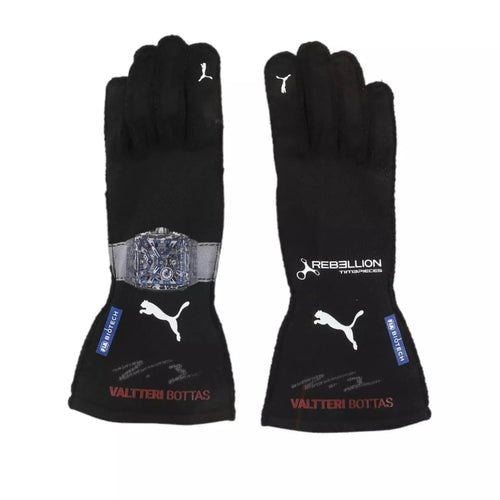 Pair of black racing gloves with white Puma logo and wrist graphic