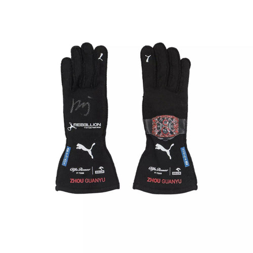 Black F1 race gloves with Puma logos and 'Zhou Guanyu' embroidery