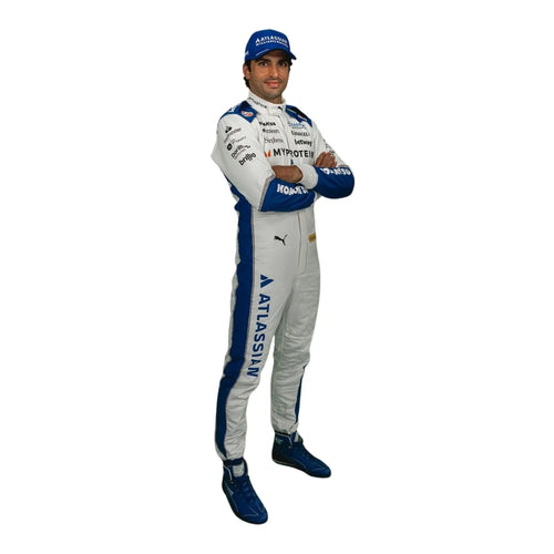 F1-style racing suit in white with blue panels, helmet-style cap, and boots