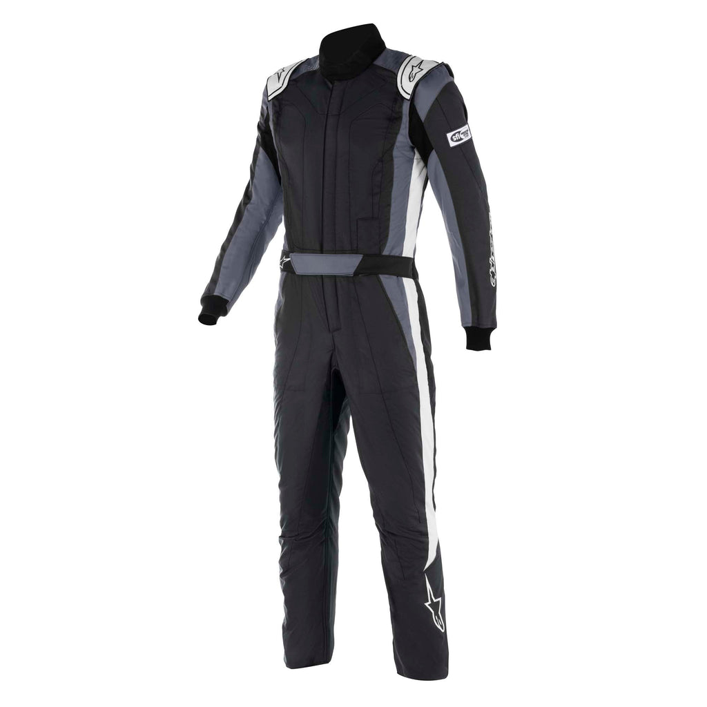 Alpinestars racing suit in navy and black with white side panels and red accents, zip front