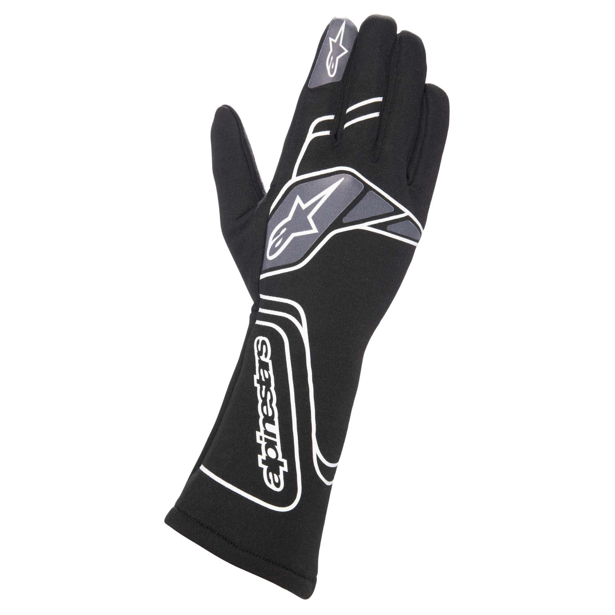 Black motorcycle riding gloves with white Alpinestars logos and padded knuckles