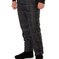 Black racing pants with grid-stitched panels and ankle cuffs