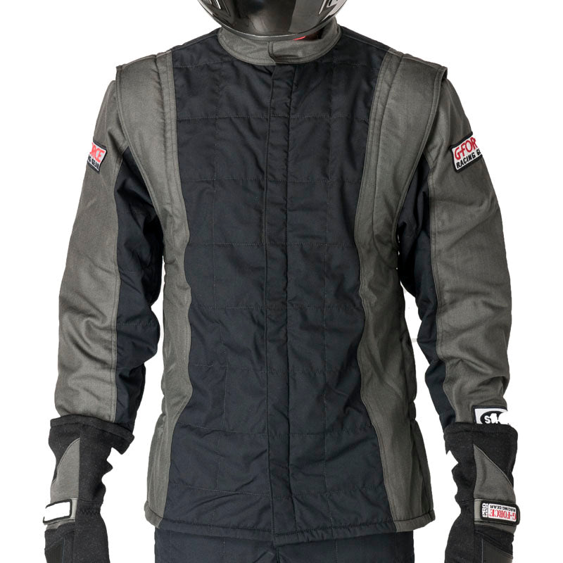 Black racing jacket with gray side panels, front zipper, padded quilting, logo patches