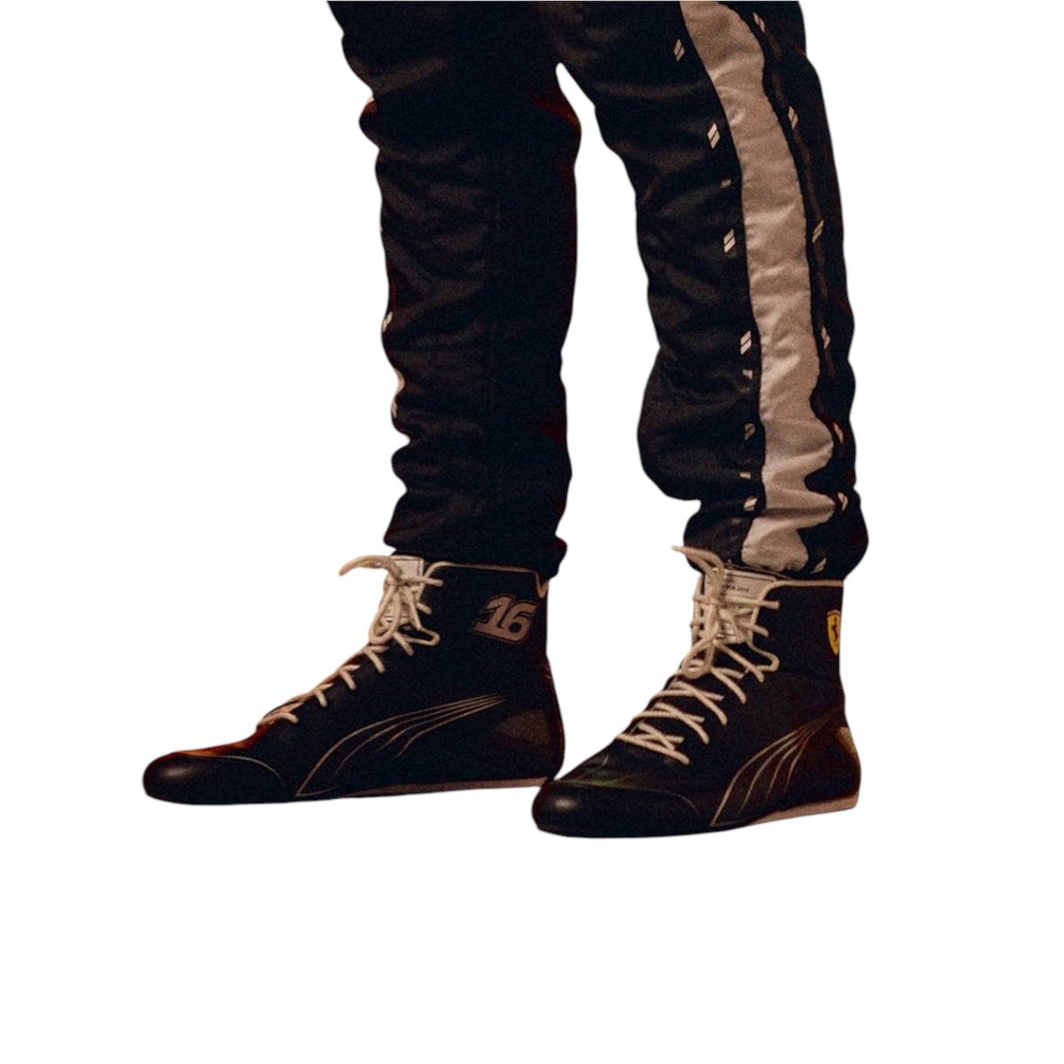 Racing suit pants with white side stripes and black race boots with laces