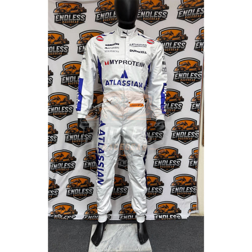 White racing suit full-body front view with blue stripe detailing and orange waist patch | Endless Racewear