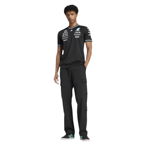 Black crewneck team driver t-shirt with small chest logos and blue sleeve trim