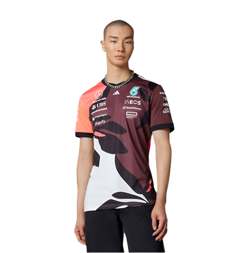 Men's team replica t-shirt with maroon, black, white, and orange graphic design