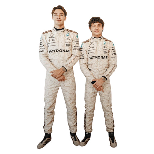 Racing suit pair in light cream with PETRONAS logos, standing with hands clasped.