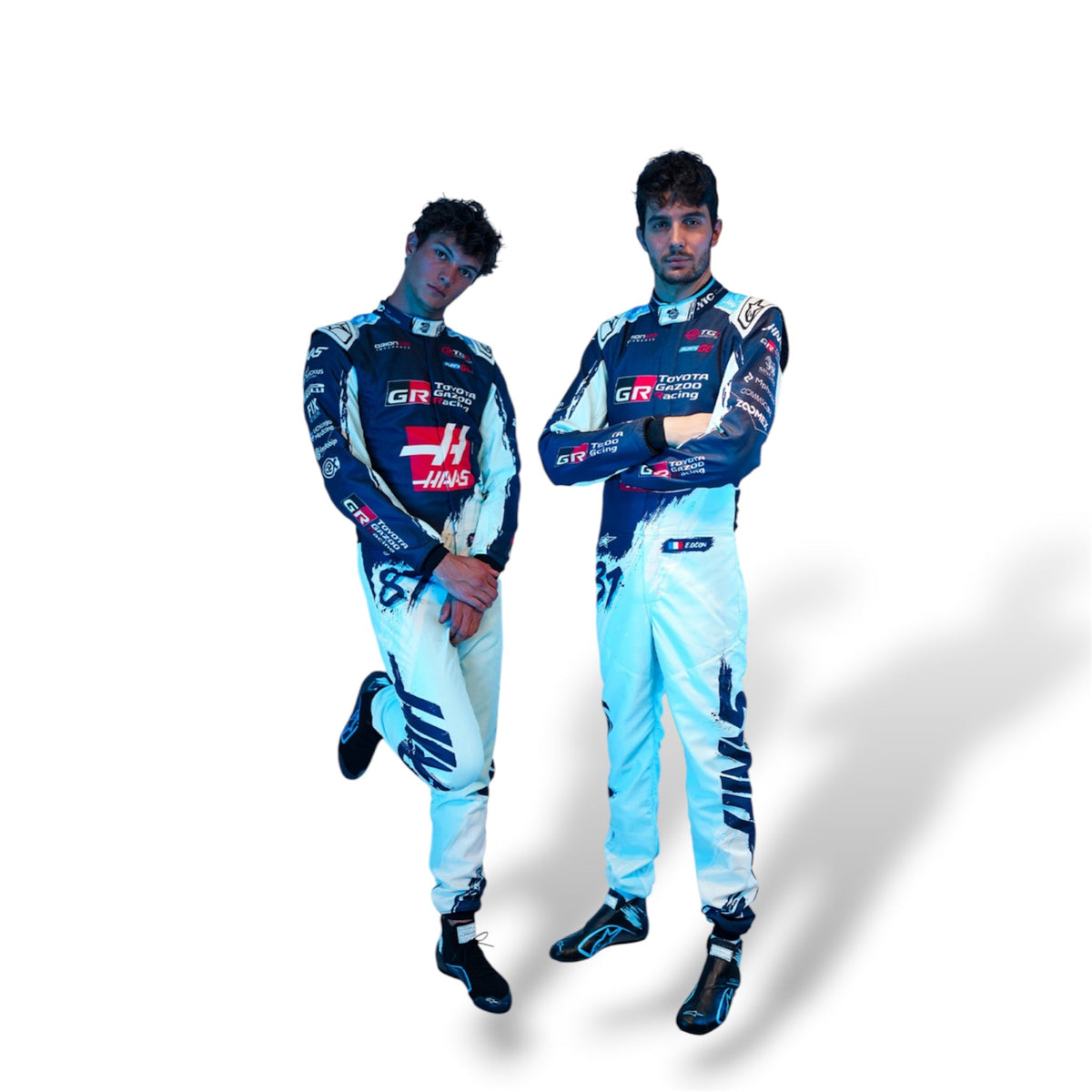 Haas F1 race suit shown on two models, with sponsor logos and dark side graphics