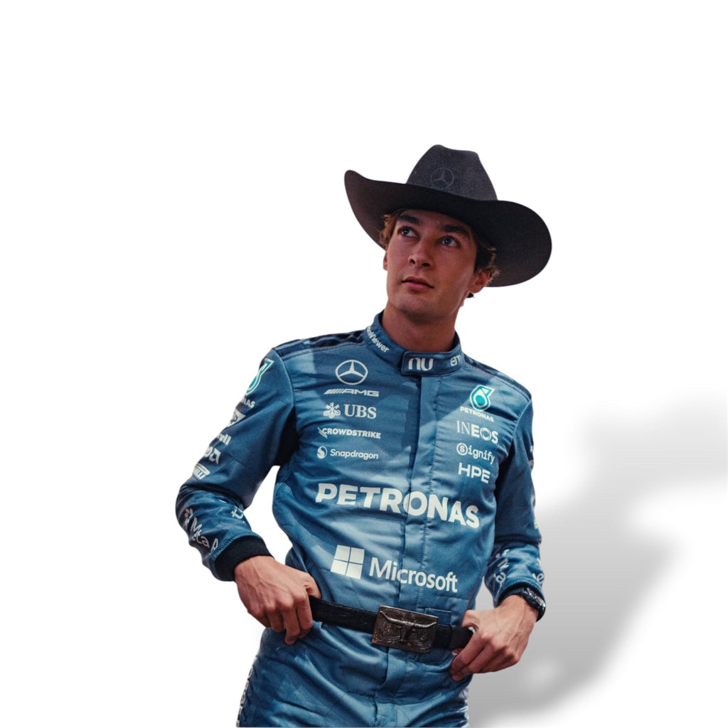 Blue Mercedes Formula 1 race suit with PETRONAS and Microsoft logos, shown from the waist up