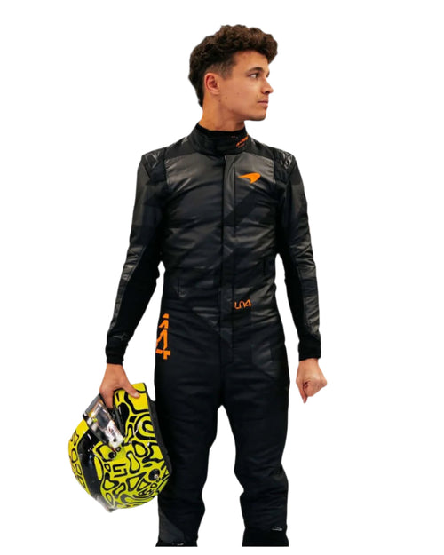 Black racing driver suit with high neck, orange logos and long sleeves.